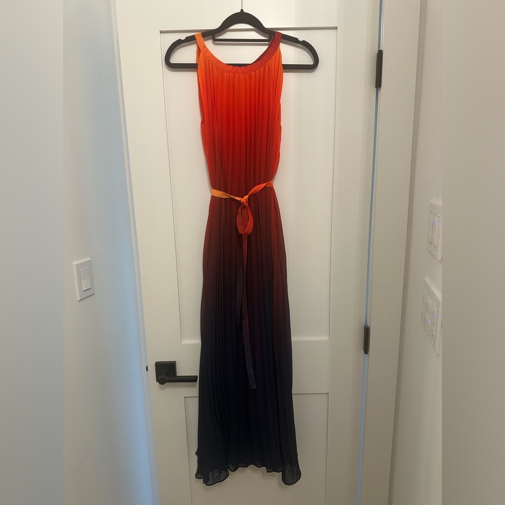 Long, pleated dress. Beautiful colors. Perfect for a wedding.